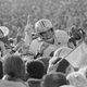 Schlichter gets carried off the field after beating Michigan in 1979